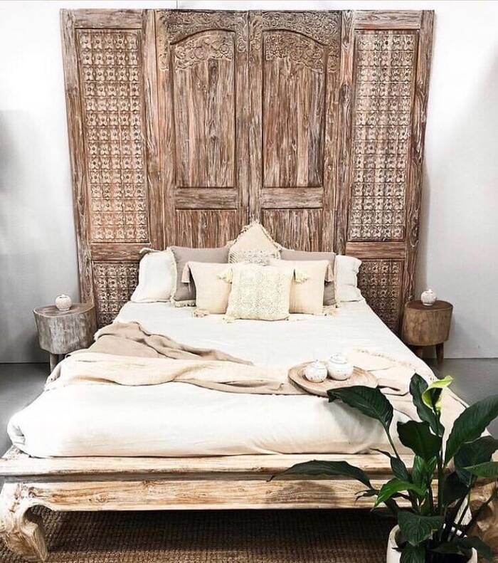 Carved panel headboard with bed
