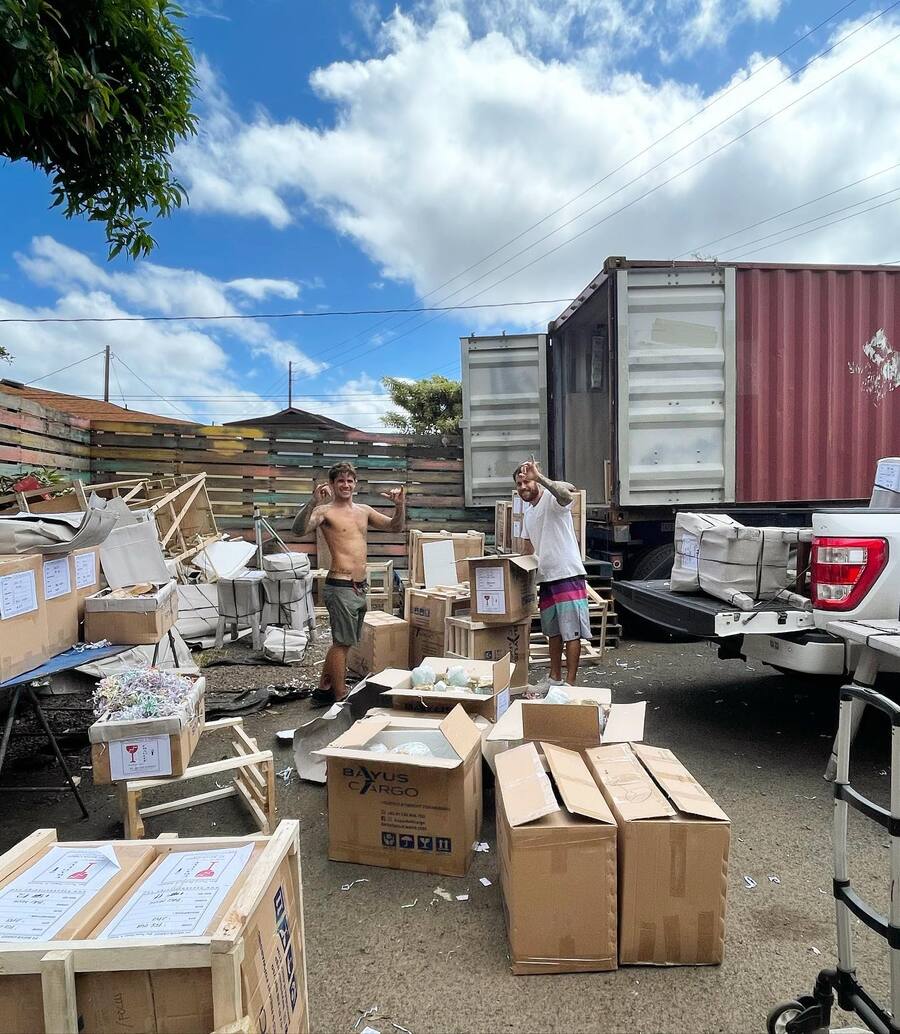 Team unloading container on O'ahu